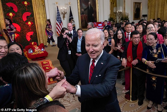 President Joe Biden greeted attendees Thursday as he departed for the Lunar New Year event, but did not answer questions from reporters about the classified documents debacle.