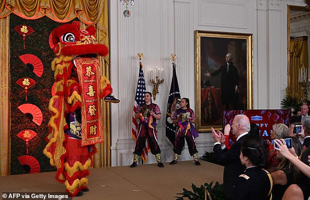 The dancers brought the dragon to its full standing during the dance and unrolled a scroll wishing health and prosperity for the new year.