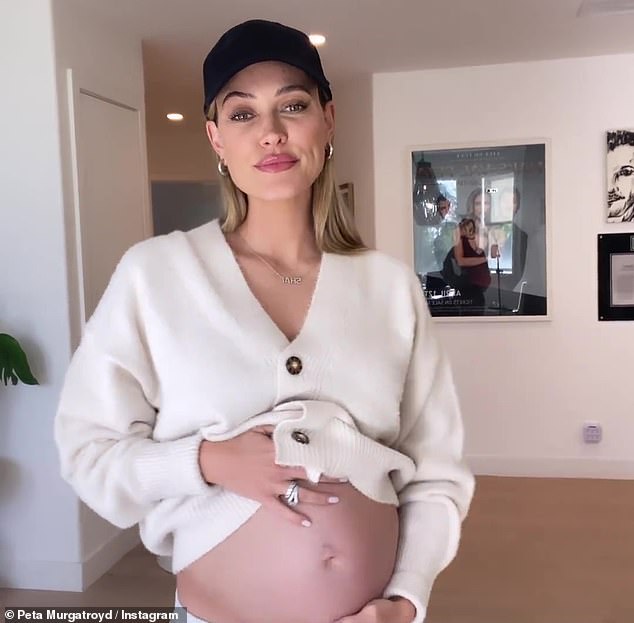 Isn't She Lovely: Dressed in a cream cardigan and black cap, the New Zealand native posed for the camera as Stevie Wonder's Isn't She Lovely plays in the background.