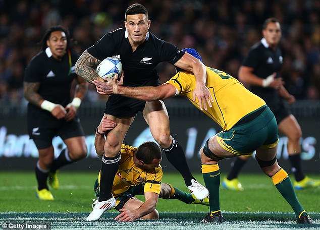 Tackles with the arms around the waist will become common, like this attempted tackle by former Wallaby Nathan Sharpe on cross-code star Sonny Bill Williams.