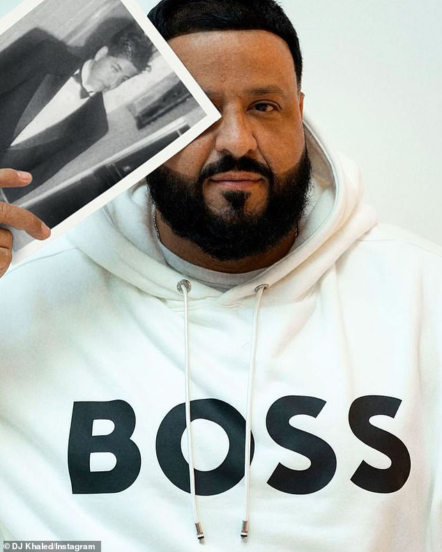 In the Suit: DJ Khaled completed some of the celebrity portraiture in a simple white 'BOSS' hoodie.  Unlike other stars who posted photos of themselves as children, he appeared to be a teenager in the image, which showed him wearing a black tuxedo.
