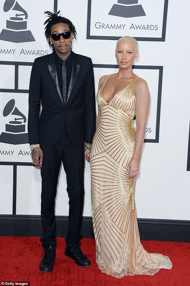 Good Terms: Despite their divorce, both Amber and Wiz Khalifa are still on good terms and not only do they have joint custody of their son, Sebastian, but they're still 'best friends now';  the former couple seen in January 2014 in Los Angeles