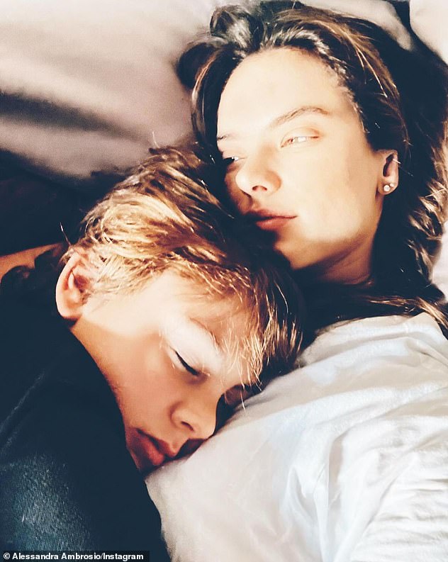 Homesickness: It comes as nostalgic GAL co-founder Floripa shared an old photo of herself in bed with her 10-year-old son, Noah Phoenix Mazur, while visiting her native Brazil on Sunday.