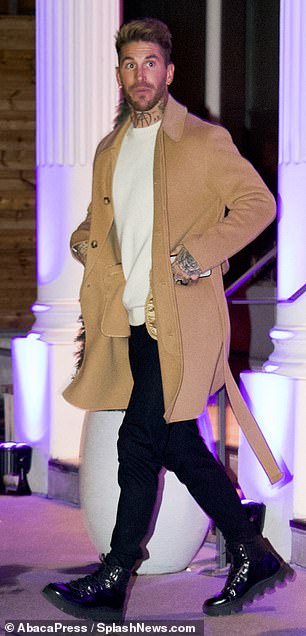 Known for his fashion sense, Sergio Ramos rocked a beige coat with leather boots.