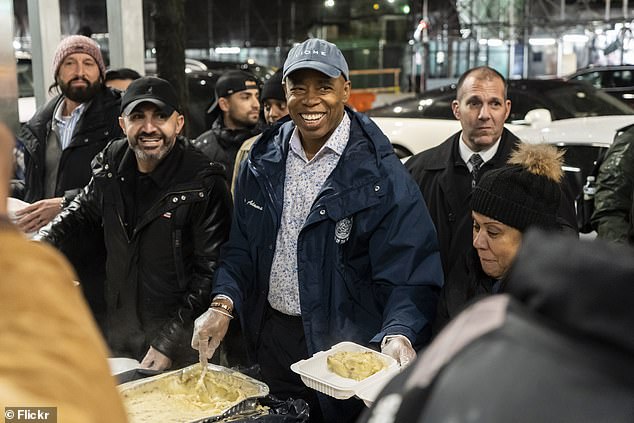 Eric Adams was photographed distributing food to New Yorkers in need on January 25.