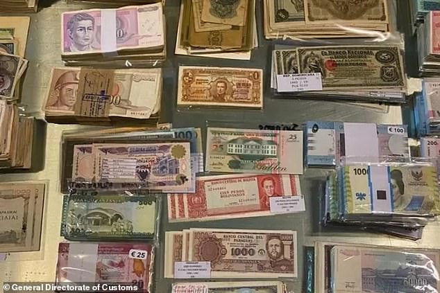 The collection of bills and coins from various countries around the world that was confiscated from a couple in Argentina on Wednesday