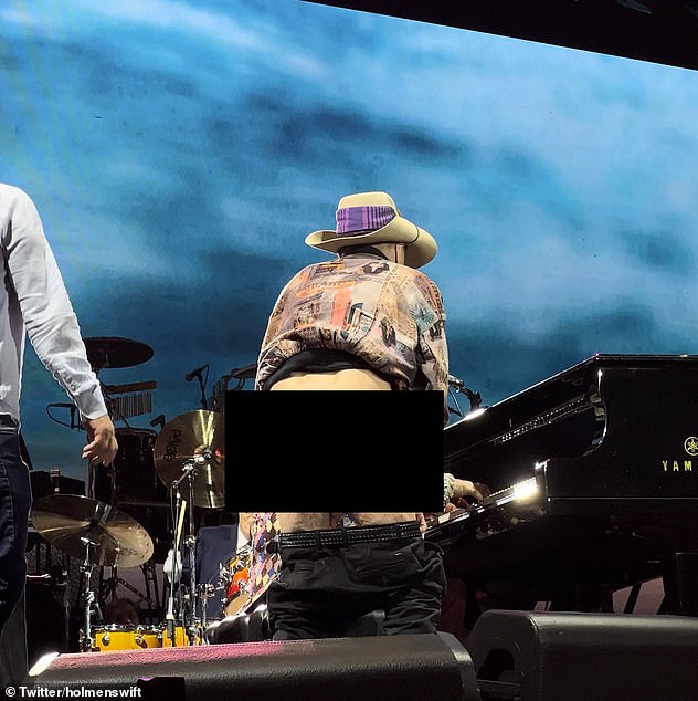 Meldrum joined Elton onstage for a performance of The B**** Is Back, where he exposed his bare buttocks to the crowd.