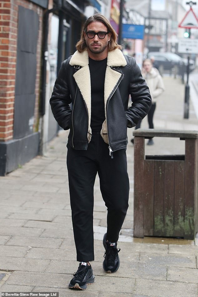 Dressing up: James Locke was also seen heading to the shoot, dressing up against the winter chill in a black leather jacket with a shearling collar.