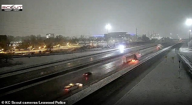 Police in Leawood, Kansas, are investigating after receiving reports around 3:40 a.m. Wednesday that a truck driving west on Interstate 435 (I-435) was dragging a silver Kia under the edge of its trailer, according to NBC.