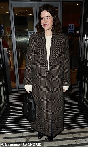 Stylish: Leaving the BBC Radio studio, Claire cut a graceful figure draped in a chic checked coat