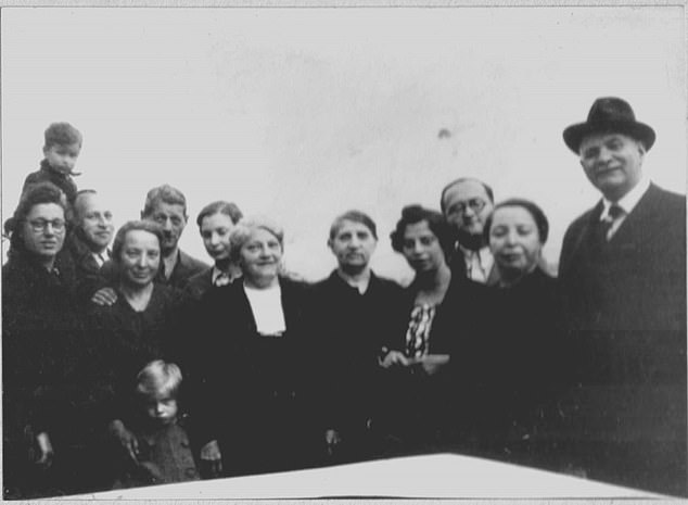 Across the border in Hungary, Tomi Komoly (pictured as a young boy top left with his family) spent his early childhood hiding from German soldiers and living in a 'safe house' set up by an embassy with his mother and 35 other people