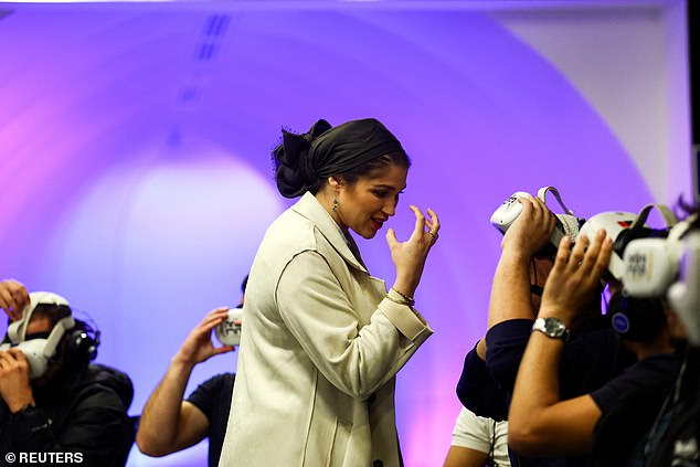 Miriam Cohen, the creative director and co-founder of Triumph of the Spirit, gestures to a participant during a virtual guided tour of the former concentration camp Auschwitz-Birkenau