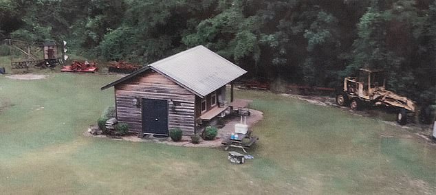 Pictured: The kennel where police found Paul's body in a pool of blood