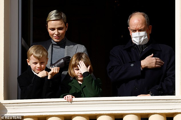 The family put on a united front, albeit with a small distance between them and with Prince Albert II wearing a mask.