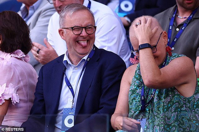 The Australian Prime Minister was seen joking and laughing in the stands while watching the semi-final.