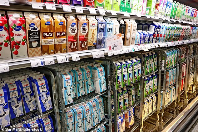 Scientists found trendy paperboard cartons - increasingly being used for milk sold in supermarkets - don't preserve its freshness or flavour as well as glass. Pictured, dairy and non-dairy milk options sold in paperboard cartons