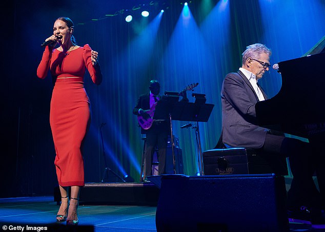 They make sweet music together: McPhee and Foster perform on stage during the PNE Winter Fair at the Pacific Coliseum in December in Vancouver, British Columbia, Canada