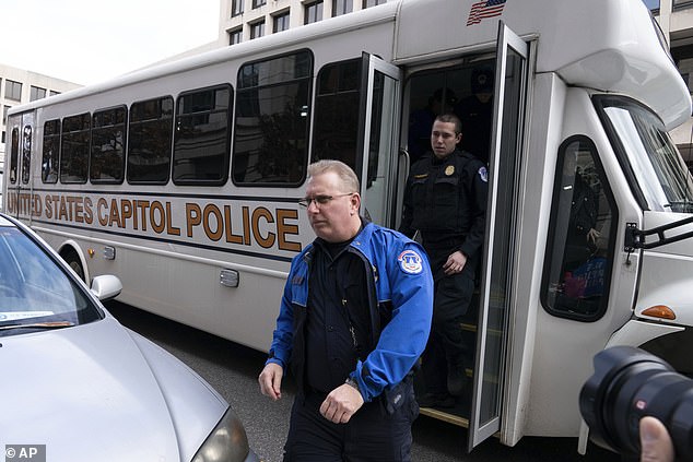 US Capitol Police officers arrive for sentencing in Washington on Friday