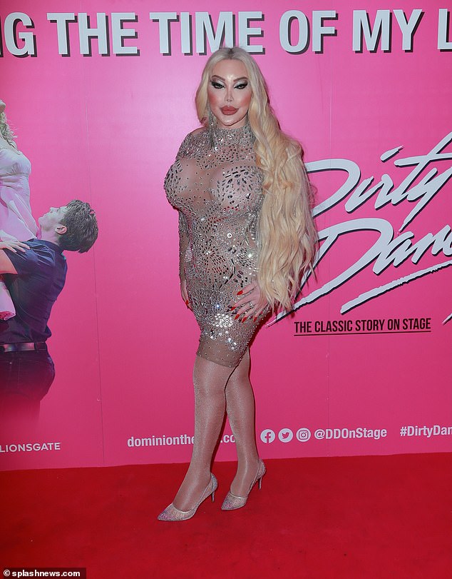 All eyes on her: Jessica opted for a more low-key outfit than the jewel-embellished nude mesh mini dress she wore to Dirty Dancing's press night on Wednesday