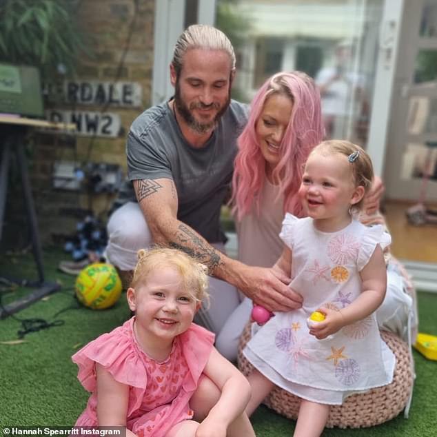 Family affair: Hannah has daughters Tea, four, and Tora, two, with fitness instructor Adam Thomas