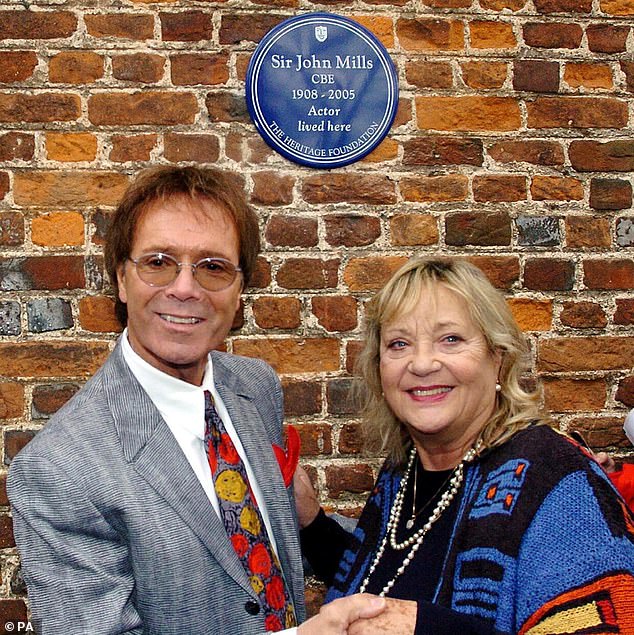 Scrambling with legends: The veteran actress appeared alongside Sir Cliff Richard (left to unveil a Blue Heritage Foundation plaque, to the late Sir John Mills at his former home in Denham, Buckinghamshire in 2006