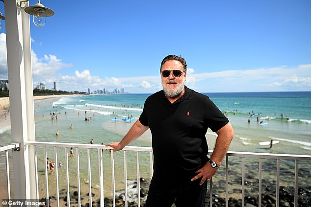 When he finished speaking, Crowe posed for photos in front of the stunning views of the clear beach from the pavilion.