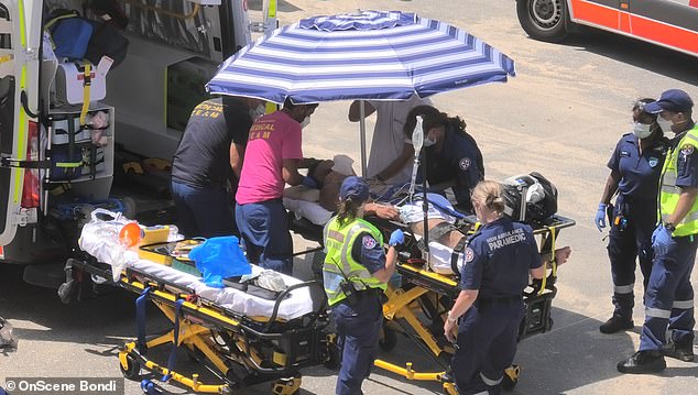 A man in his 40s was underwater for three minutes and was unconscious when lifeguards arrived.  He was taken by ambulance to St George's Hospital in critical condition.