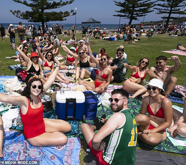 One percent of sunscreen users will have a bad reaction to the product (pictured, revelers at Coogee Beach on Australia Day)