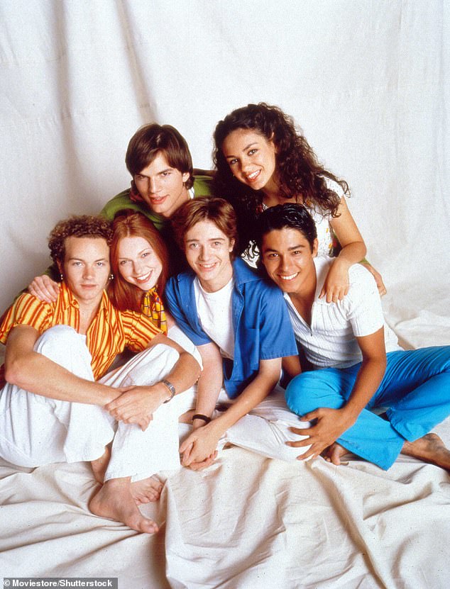 stars;  Many of the main stars of That '70s Show also appeared in the spin-off, including Orange Is the New Black actress Laura Prepon, Home Economics actor Topher Grace, and Charming voice actor Wilmer Valderrama (from left to right: Danny Masterson, Prepon, Kutcher, Grace, Kunis, Valderama)