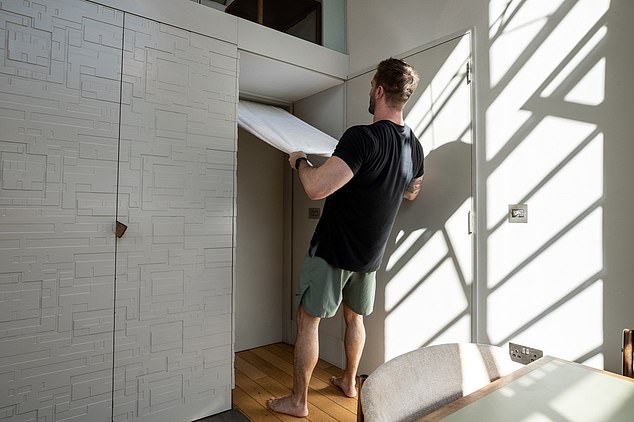 Using the towel pull yourself in a straight line. As you pull yourself up you should feel the muscles in your upper back and the front of your arms working