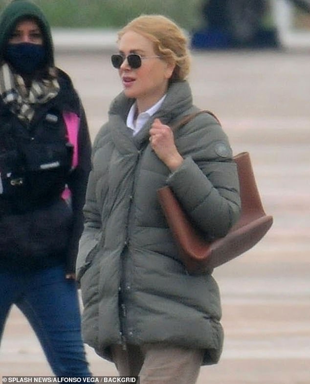 Wardrobe Change: At one point, Academy Award winner Nicole changed into a khaki puffer jacket while walking on set.