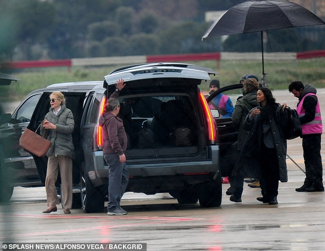 Behind the scenes: The stars appeared to have been sent to the set via private car while filming on the runway.