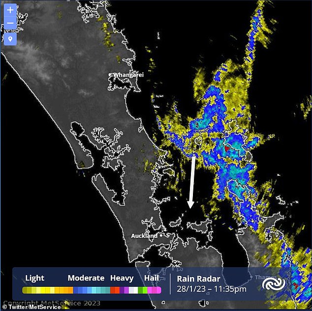 Aucklanders have been urged to stay home if it is safe to do so with more rain lashing the flood-hit city on Sunday (rain radar for Auckland on Saturday night pictured)