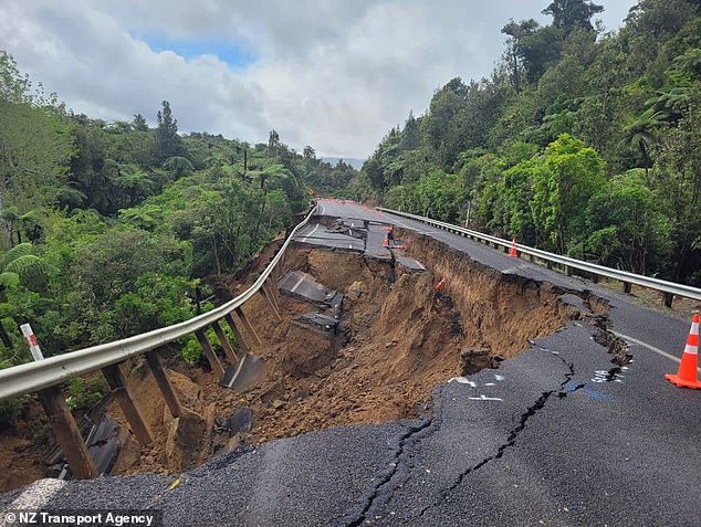 Flooding has caused extensive damage to major infrastructure around Auckland (a damaged road is pictured)