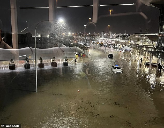 New Zealand's weather center weather service said 154mm of rain fell on the airport (above) between 9am and 8pm on Friday;  the 12-hour record for the area is 161.8 mm