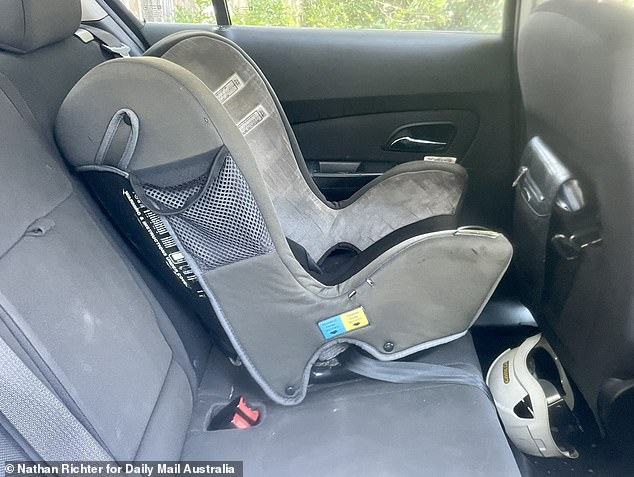 A single child seat could be seen at the rear, along with some Centrelink documents tucked into the side of the door.