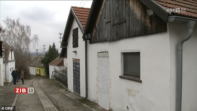 Many of the basement doors and windows were boarded up, footage from the scene shows.