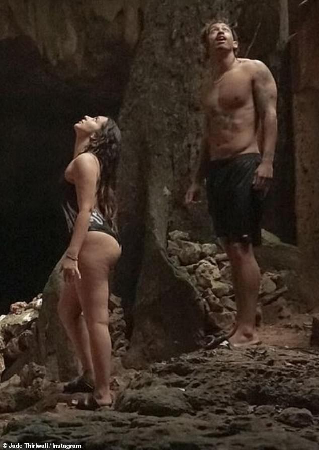 Couple: The Little Mix star, 30, donned the figure-hugging one-piece as she and her partner, 31, explored a cave system on their trip