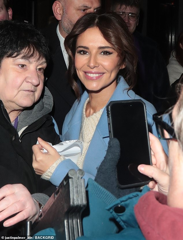 Happy: The singer appeared happy and relaxed as she smiled, posed with fans and took selfies