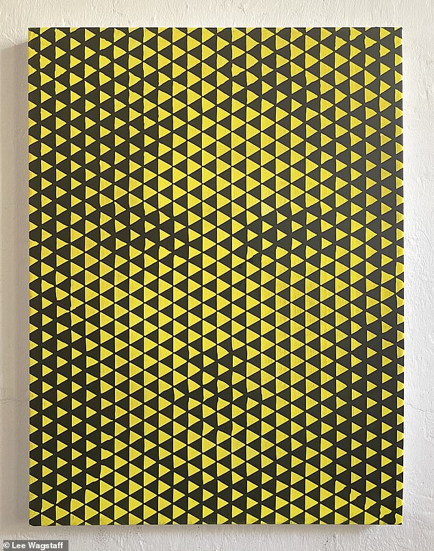 Readers' eyes are drawn to the face in this image by the contrasting yellow and black triangles.