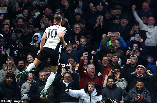 The Fulham midfielder celebrated his first goal of the season in front of the home fans