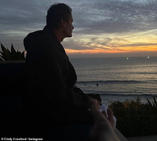 Ocean Views: Cindy included a romantic photo of her 60-year-old husband Rande Gerber, model-turned-mogul.  She captured the Casamigos founder looking out over a dazzling horizon.