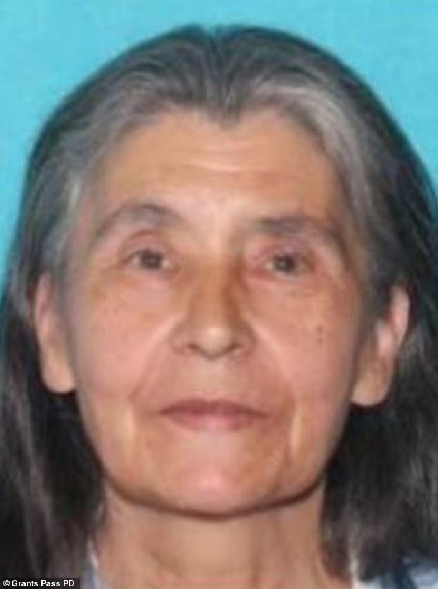 The home was owned by Tina Marie Jones, 68, of Wolf Creek, (pictured), who was arrested on two counts of hindering prosecution for allegedly helping him hide.