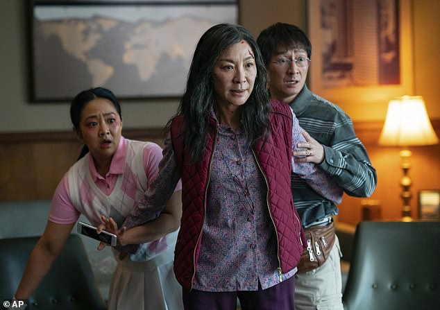 Comeback vehicle: Quan has been dominating the awards circuit for his stellar performance as a naive husband in Everything Everywhere All at Once, repeatedly winning the Best Supporting Actor category (pictured in a still from the film with co-stars Stephanie Hsu and Michelle Yeoh)