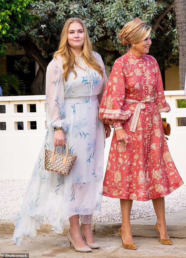 Known for her color scheme, Máxima (pictured right) opted for a brown headband to brush back her locks, and a matching bag and pair of heels.