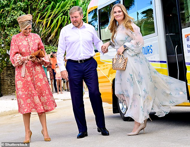 King Willem-Alexander (center of photo) made sure to look as smart as his family, sporting a pair of royal blue pants and a crisp white shirt.