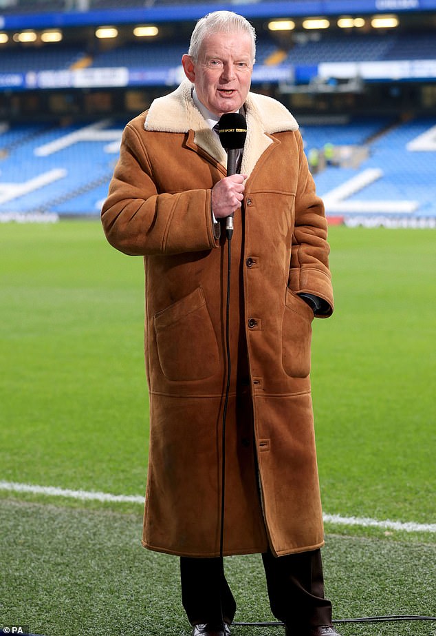 In fashion: John Motson, now 77, became famous for his shearling coat while covering a Wycombe Wanderers match in horizontal slush in 1990