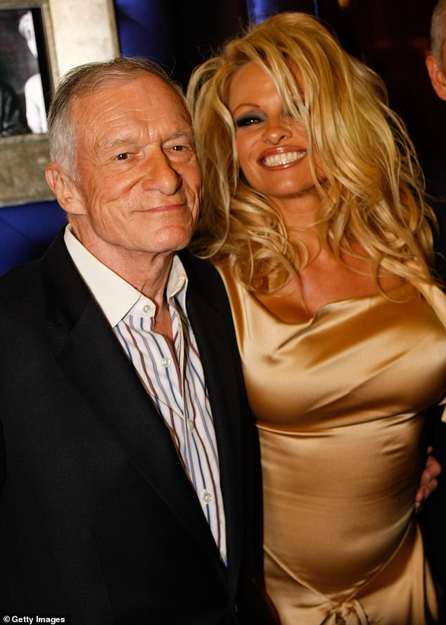 Controversial friend: Anderson has graced the cover of Playboy a record 14 times, but since his death in 2017 at the age of 91, Hefner's legacy has been marred by controversy and multiple allegations of abuse.