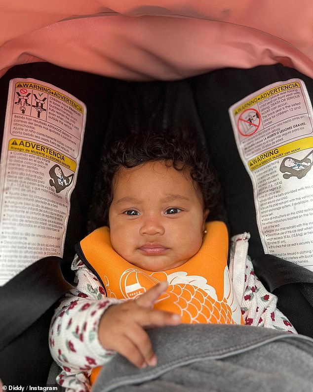 Buckled up: The 53-year-old rapper/record producer captured his baby girl looking adorable as she was strapped into her car seat in a comfy floral-print bodysuit.