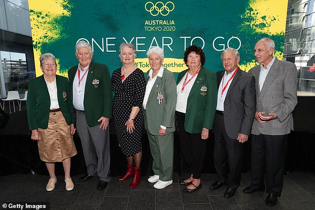 Coles (pictured second from right with legendary Australian Olympian Dawn Fraser, center) also represented his country in canoeing at the 1960, '64 and '68 Games.